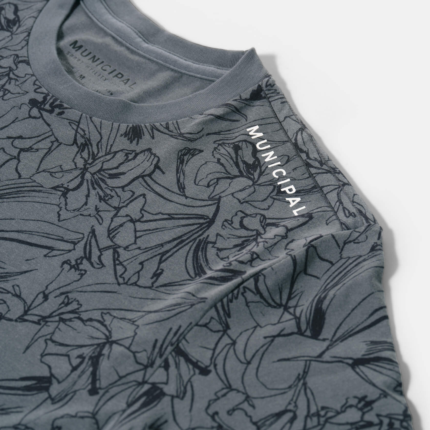 Enduro Stretch T-Shirt |Charcoal Sketch Floral / Natural| logo
